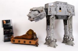 STAR WARS; A collection of assorted Star Wars toys to include an ATAT Walker (with chin guns,