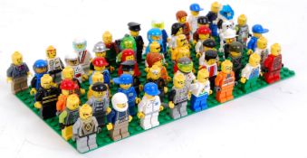 LEGO: A collection of 50x assorted Lego minifigures to include: vintage, Space, Racing, Knights,