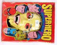 SUPERHERO COSTUME: a vintage boxed Berwick ' Superhero Costume & Mask Set .' Dracula set.