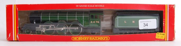 HORNBY: An original Hornby 00 gauge railway trainset locomotive R042 Royal Lancer, with tender.