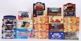 DIECAST: A collection of 20x assorted boxed diecast model cars to include Corgi,