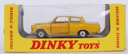DINKY: An original Dinky Toys diecast model 1965 Ford Cortina, gold variation No. 133.