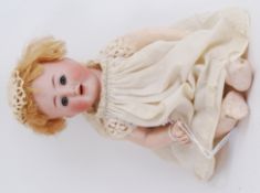 GERMAN DOLL: An antique German doll - marked to rear of neck ' AB (?) ' ' 1352 / 23 ' Made In