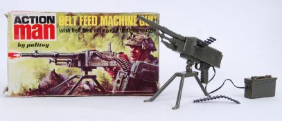 ACTION MAN: An original vintage Palitoy Action Man ' Belt Feed Machine Gun ' within the original