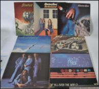 A collection of seven Status Quo vinyl m