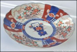 A 19th century Imari pattern plate with