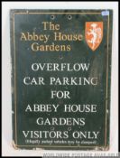 A vintage painted wooden advertising sig