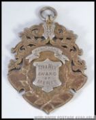 A silver and gilded Victorian cyclists m