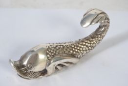 A vintage white metal / plated Maltese d