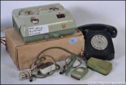A vintage GEC ring dial telephone, along