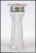 A silver hallmarked and cut glass vase o