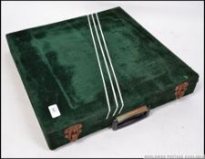 A 20th century velour cased chess set. E