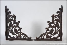 A pair of 20th century exterior wall han