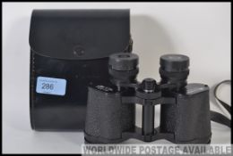 Pair of vintage medium sized binoculars