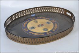 A good quality brass 20th century oval b