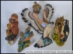 A collection of Bosson's wall plaques in