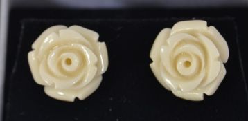 A pair of 925 silver earrings with carve