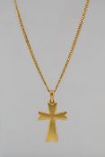 A heavy 18ct gold chain link necklace with large crucifix pendant and hook clasp unmarked.