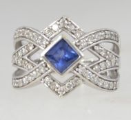 A 925 silver Art Deco crossover ring wit