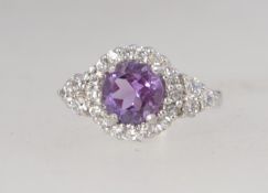 A 925 silver ring set with a central ame