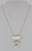 A 925 silver drop articulated pendant ne