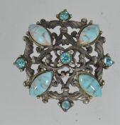 A vintage white metal brooch pin set wit