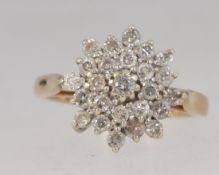 An 9ct gold and diamond ladies cluster r