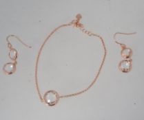 A 925 silver gold plated earring and bra