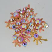 A 1950s vintage yellow metal enamelled b