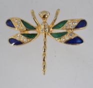 A vintage brooch in the form of a dragon