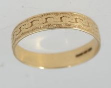 A hallmarked Birmingham 9ct gold band