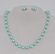 A good pearl twin set with knotted paste