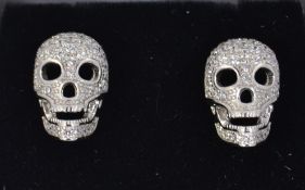 A pair of designer 925 silver stud earri
