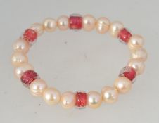 A contemporary pearl bracelet strung wit