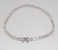 A 925 silver channel set CZ line bracel