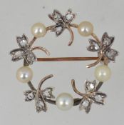 An Edwardian tested 9ct gold wreath broo