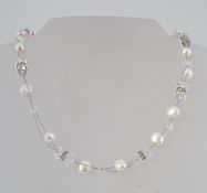 A contemporary pearl necklace strung wit