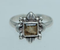 A 925 silver ring set with a square cut