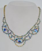 A vintage yellow metal peacock Aurora Bo