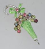 A vintage white metal enamel umbrella fl