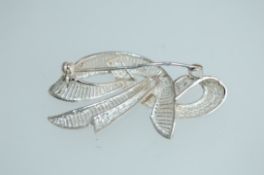 A 1950s German 935 silver brooch in a f