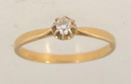 A vintage 18ct gold solitaire diamond ri