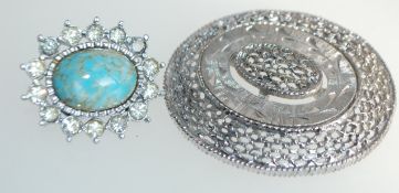 Two vintage white metal brooches one set