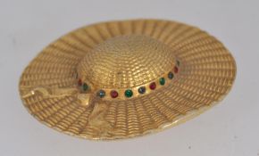 A large vintage yellow metal brooch pin