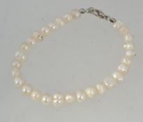A white metal baroque pearl bracelet. Me