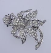 A vintage white metal paste set brooch i