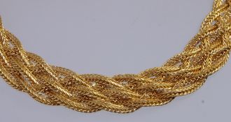 A vintage signed Monet yellow metal wove