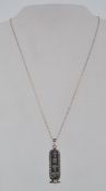 A vintage Egyptian cartouch pendant neck