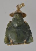 A 1950s carved jade budda pendant with y