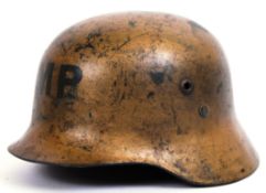 ROMANIAN HELMET: A rare Romanian steel MP Military Police helmet, in gold colouring. MP to front.